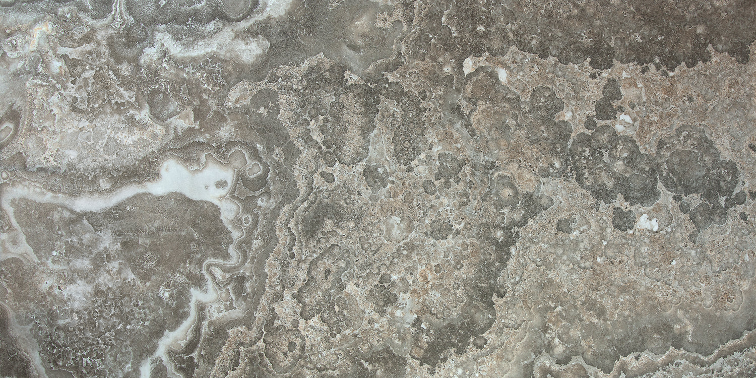Close-up of a polished porcelain tile with green and brown tones
