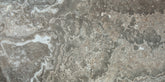 Close-up of a polished porcelain tile with green and brown tones