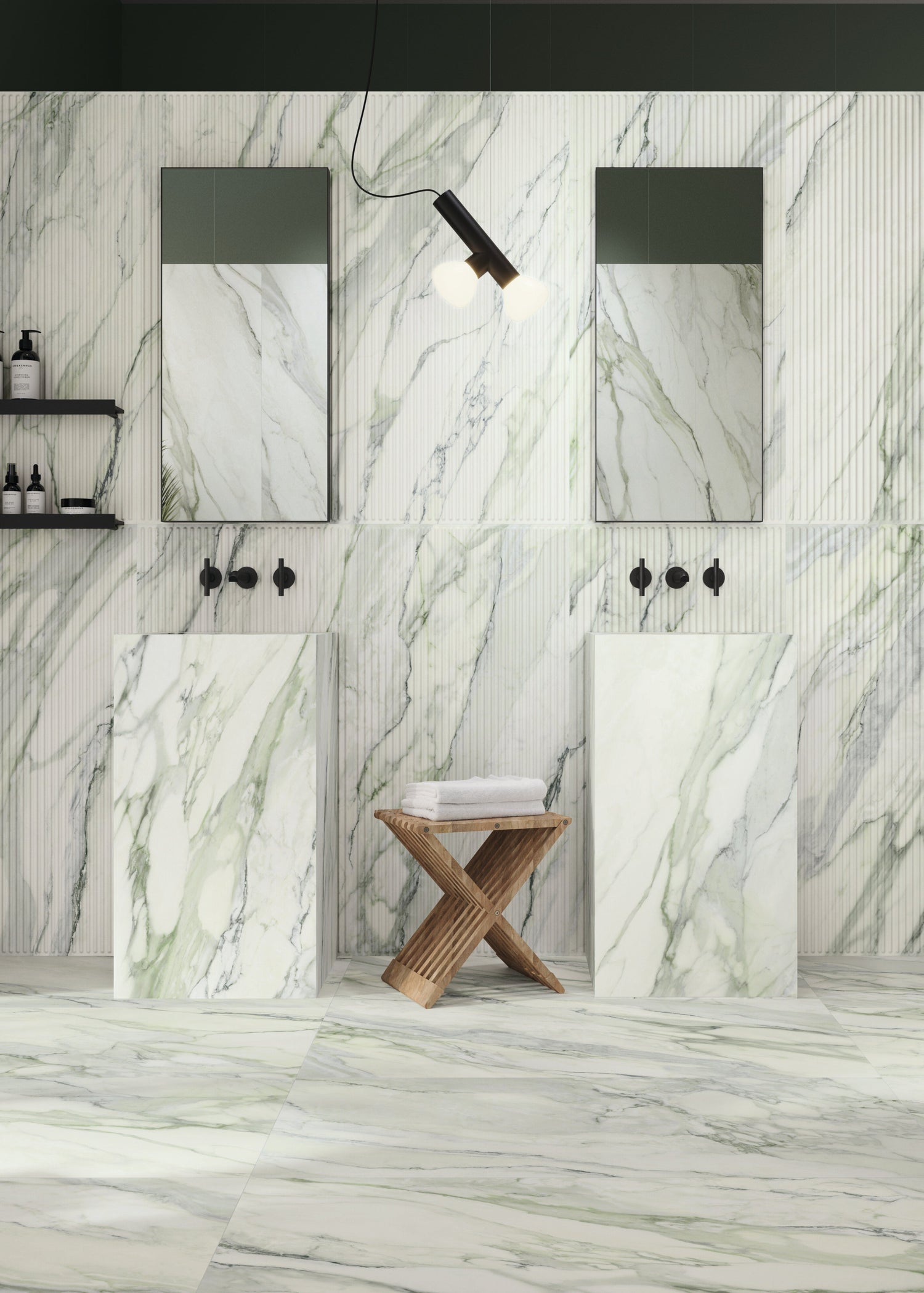 Modern bathroom with marble walls and floor, featuring two sinks and mirrors.