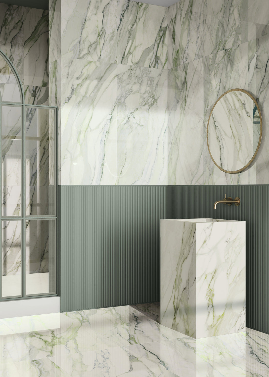 Modern bathroom with green marble walls and a sink.
